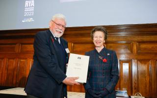 John Wylson, Vice President of the Lowestoft-based Excelsior Trust receives his award from HRH The Princess Anne. Picture: Paul Wyeth/RYA