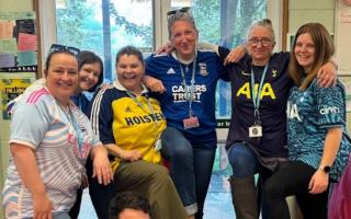 Tom Ramsden - centre - has been raising money for his best mate Gary. Today, he and staff at Suffolk Rural backed Football Shirt Friday to raise money and awareness of cancer research