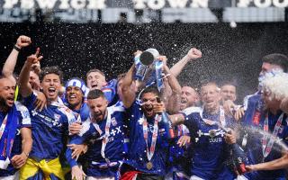 Ipswich Town players celebrate promotion this afternoon